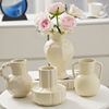 Light luxury ornaments, simple modern ceramic vase, cream feng shui water cultivation, flowers, dining table, living room, flower arrangement decoration