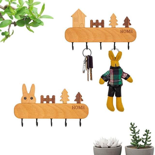 The key hook can enter the door. The key is closed. The wall decoration is hung on the wall key storage rack. The black solid wood loves the Nordic
