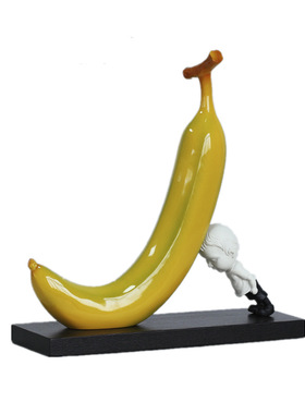 简约现代创意小孩子头顶黄色香蕉水果可爱个O性客厅桌面装饰品摆