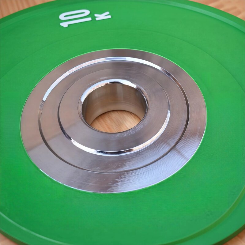 Colorful rubber barbell plates with large holes for competitive fitness home deadlifts, squats and presses for ladies buttocks dumbbell plates