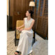 Maven Lin ຊຸດເສື້ອເຊີດທີ່ບໍ່ມີແຂນທີ່ຫລູຫລາແລະສູງສໍາລັບແມ່ຍິງທີ່ມີຄໍຮອບ, ເປີດ V ຂະຫນາດນ້ອຍ, ແອວແລະກະໂປງຍາວສີຂາວທີ່ສະຫງ່າງາມ