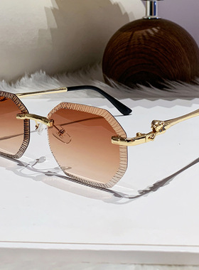 欧洲站2025新款卡家锯齿无框太阳镜欧美ins时尚豹子头金属墨镜大