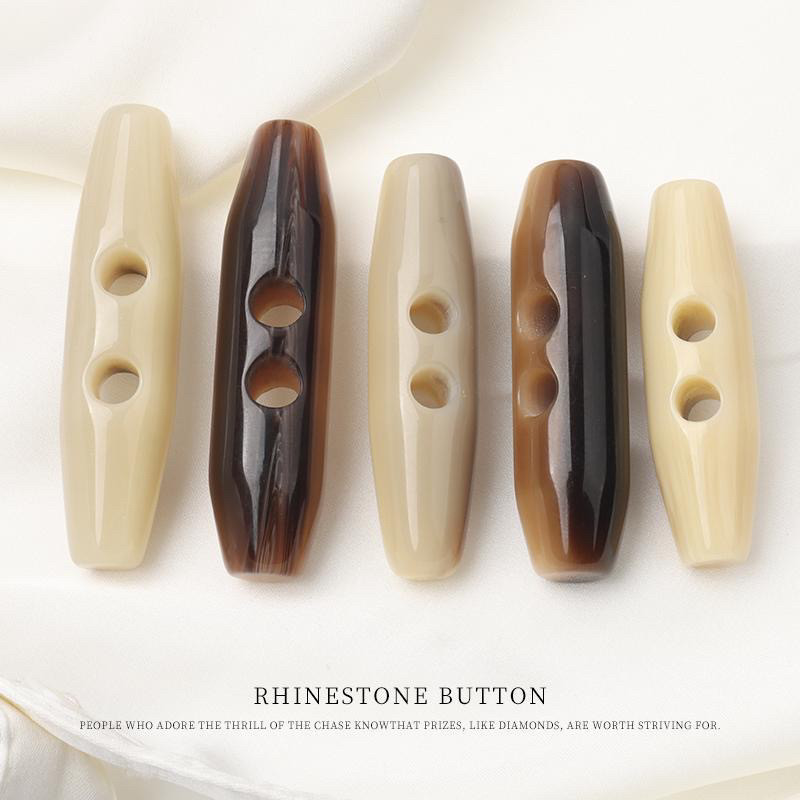 树脂花纹橄榄纽扣牛角扣毛呢大衣风衣对扣儿童外套棉衣搭扣配件 - 图1