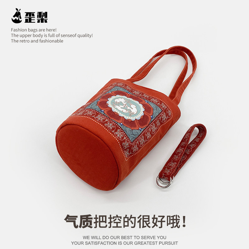 中国风敦煌福兔三兔共耳莲花手提水桶包包复古国潮通勤帆布收纳袋,淘宝优惠券,粉丝福利购,淘宝优惠卷