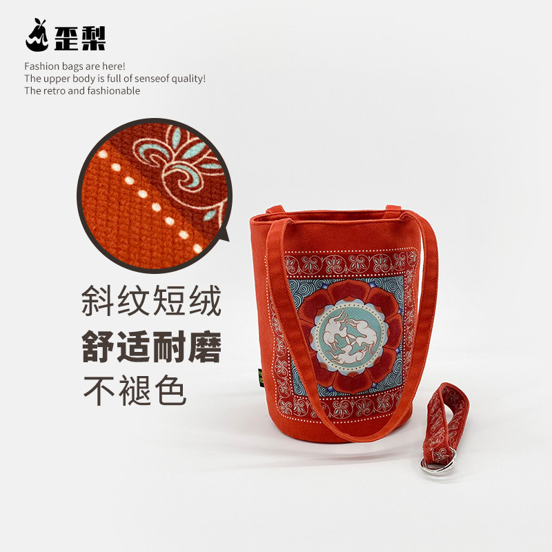 中国风敦煌福兔三兔共耳莲花手提水桶包包复古国潮通勤帆布收纳袋,淘宝优惠券,粉丝福利购,淘宝优惠卷