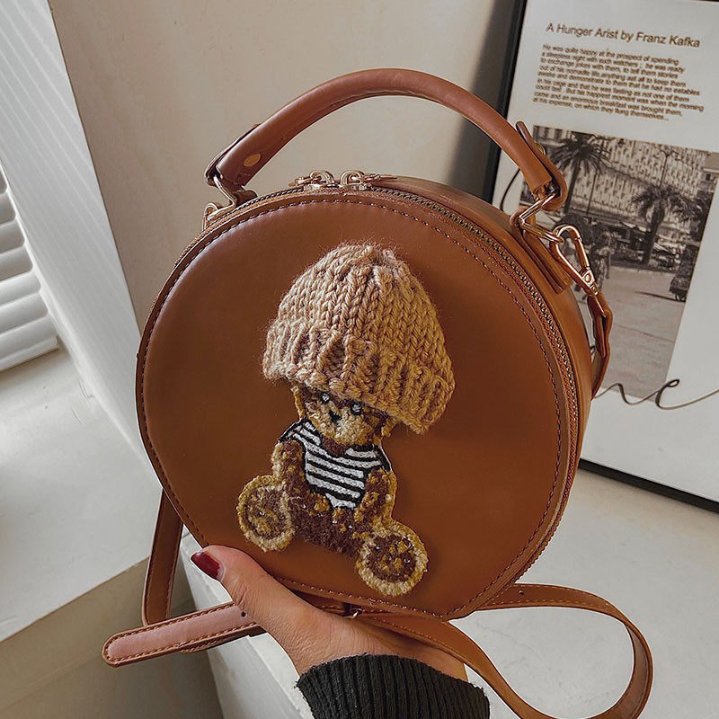 高级感可爱小众手提包包女春夏2025新款时尚少女斜挎包洋气小圆包,淘宝优惠券,粉丝福利购,淘宝优惠卷