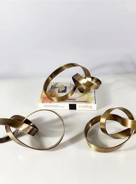 现代软装样板房民宿室内多面金属黄铜创意金色飘带抽象摆件设