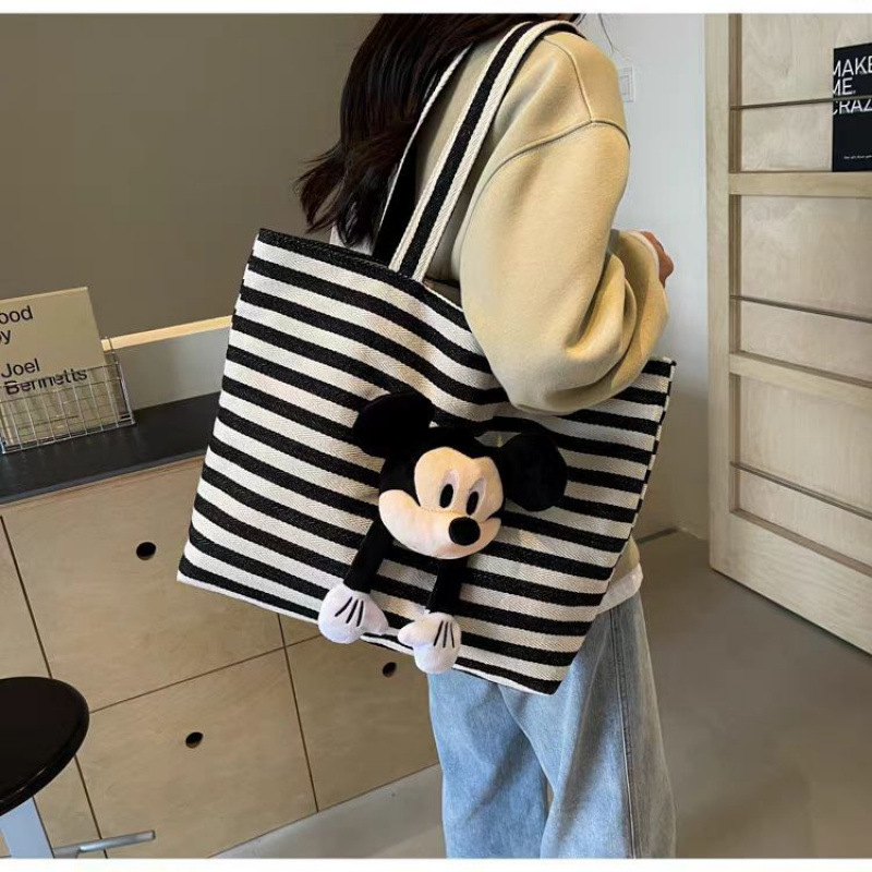 女包2025新款超火百搭帆布包大容量条纹通勤托特包单肩包 - 图1