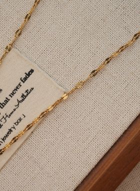 丹珞钛钢新中式复古红色毛衣链