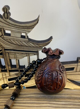 紫檀雕刻福袋手把件手玩挂件文玩车挂