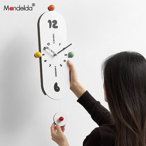 Mandelda免打孔现代简约钟表挂钟客厅家用奶油风创意摇摆时钟挂墙 - 图0