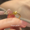 Golden sparkling crushed ice love ring for women