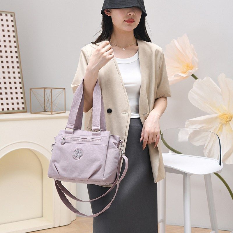 手提包女2025新款大容量尼龙帆布单G肩斜挎包通勤牛津布百搭背包,淘宝优惠券,粉丝福利购,淘宝优惠卷