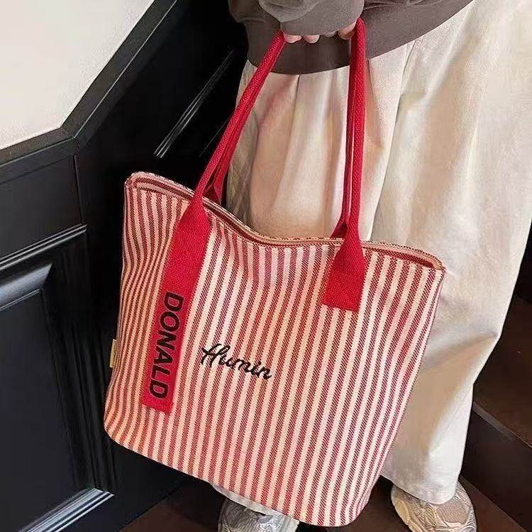 新款条纹帆布包包女新款大容量上课手提袋韩系单肩通勤托特包,淘宝优惠券,粉丝福利购,淘宝优惠卷