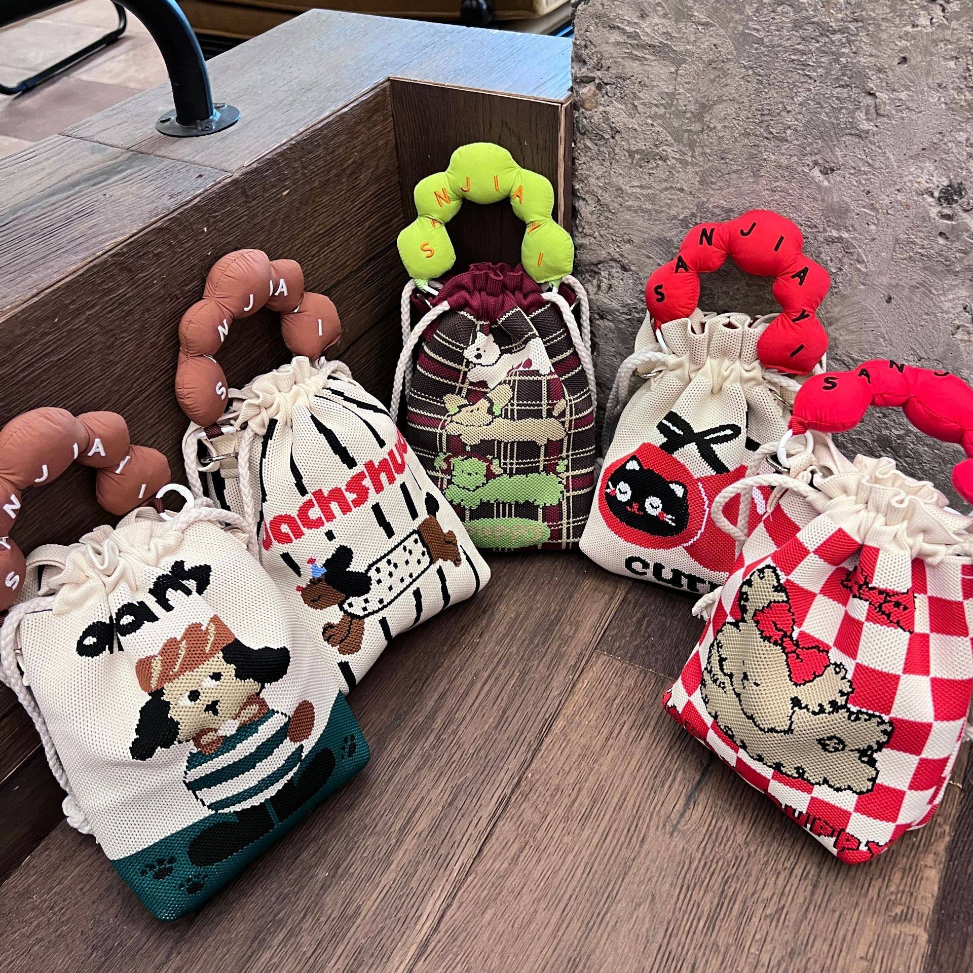 新款小福袋手柄包高品质针织包百搭设计手提袋抽绳包大容量斜挎包,淘宝优惠券,粉丝福利购,淘宝优惠卷