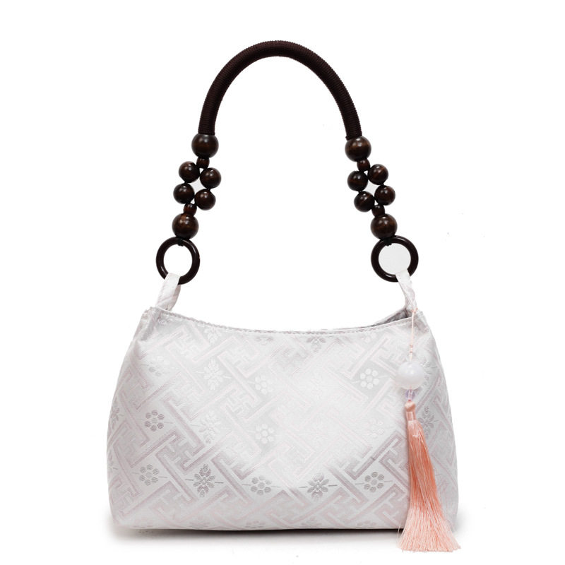 广西壮锦包包新中式腋下包包女2025新款夏天简约布包单肩手提包,淘宝优惠券,粉丝福利购,淘宝优惠卷