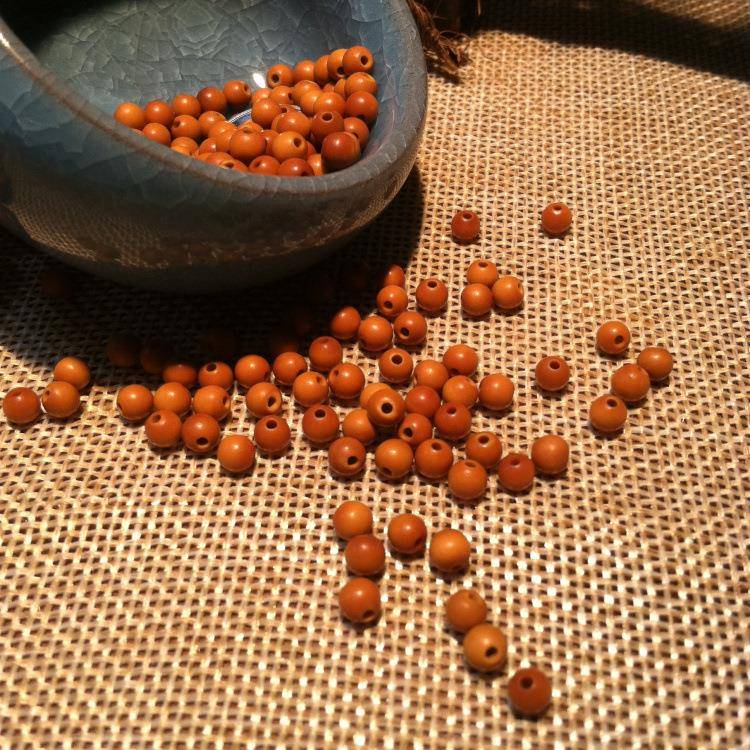 精品橄榄核小圆珠核尖珠近正圆珠光珠子弟珠隔珠文玩配件直销 - 图1