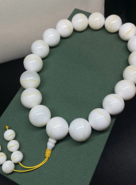 天然金丝手持一线玉化贝壳七宝