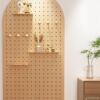 Round colored fan-shaped wooden perforated board storage rack on the wall Customized Nordic curved background decorative storage rack