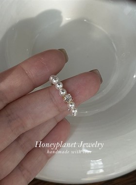 森糖星球爆闪锆石施家正圆珍珠弹力绳戒指气质法式高级女高保色