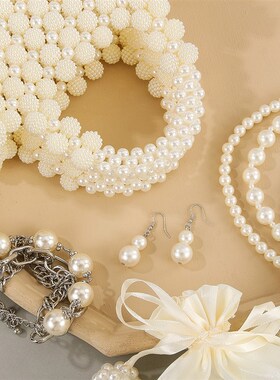 法式镂空珍珠手提包2024新款潮高颜值网红百搭个性手工串珠手拿包