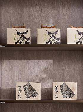 新中式样板间茶室书房茶柜摆件侘寂风高级感茶饼茶叶罐茶叶袋装饰