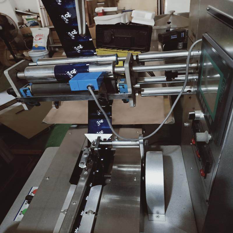 压片糖果自动理料薄荷糖枕式包装机鸡内金山楂片高速糖果包装机,淘宝优惠券,粉丝福利购,淘宝优惠卷