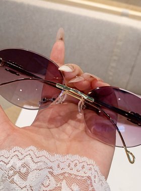 2025无框墨镜女高级感凯旋门复古时尚防晒太阳镜椭圆框金属墨镜男