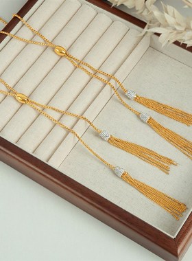 新款时尚简约个性小众设计钛钢镀18K金镶钻流P苏毛衣链项链饰品女