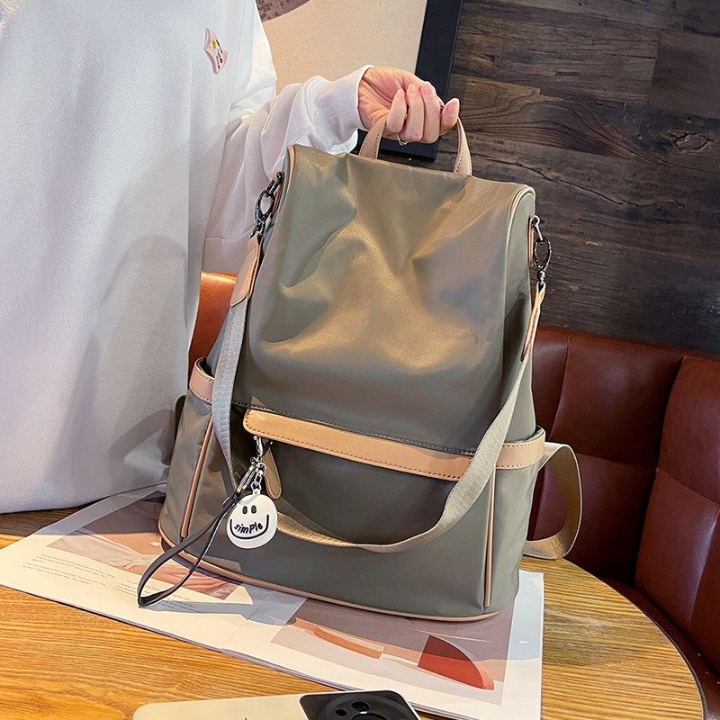 高级感防盗双肩包女2024新款时尚轻便防水牛津布女士背包旅游书包,淘宝优惠券,粉丝福利购,淘宝优惠卷