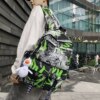 Backpack men's new large-capacity graffiti trendy sports and leisure travel computer backpack female junior high school school bag