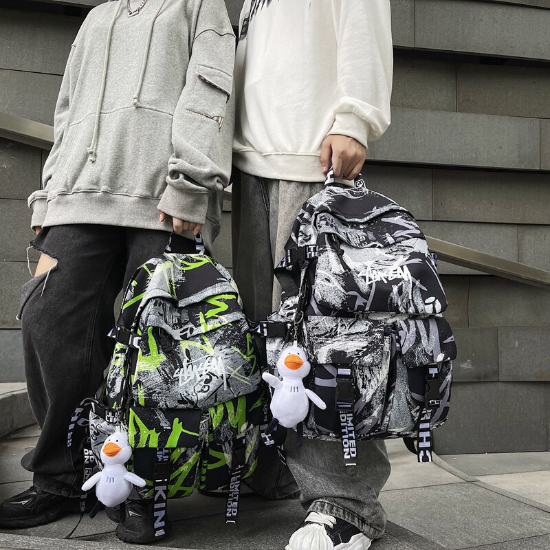 Backpack men's new large-capacity graffiti trendy sports and leisure travel computer backpack female junior high school school bag