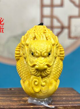 黄杨木雕招财龙吐息挂件