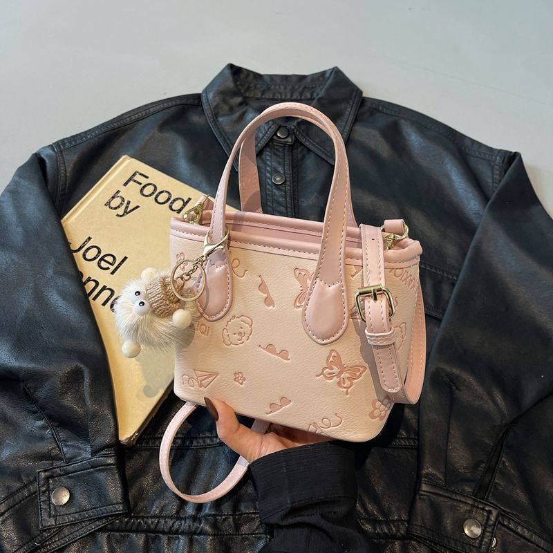 今年流行爆款小包包女春夏2025新款百搭斜挎包韩版手提迷你水桶包,淘宝优惠券,粉丝福利购,淘宝优惠卷