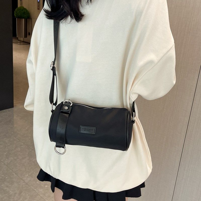 【背部有贴袋】休闲宽肩带小众牛津布圆筒包斜挎包2024新款小包包,淘宝优惠券,粉丝福利购,淘宝优惠卷