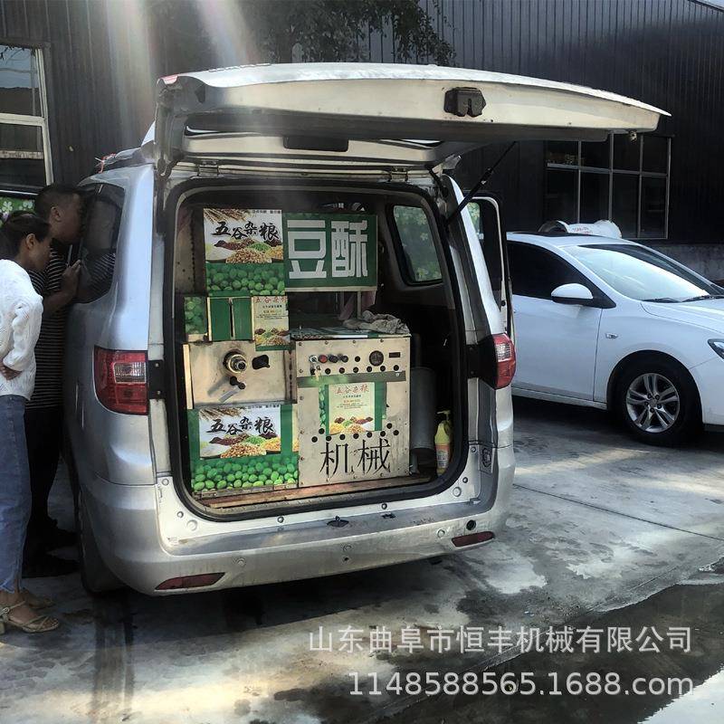 Multifunctional small puffing machine Qingdao corn rice food puffing machine box type twist puffing machine