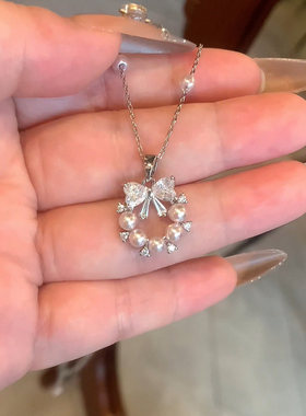 S925纯银千金爆闪蝴蝶结珍珠项链