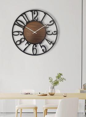 现代风客厅高级轻奢时钟家用艺术感创意钟表铁木摆件简约静音表