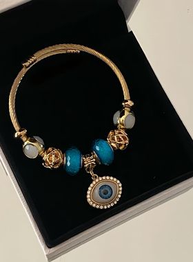 欧美潘家多啦新款时候手镯眼睛珍珠镶钻手链高级感吊坠可调节手环