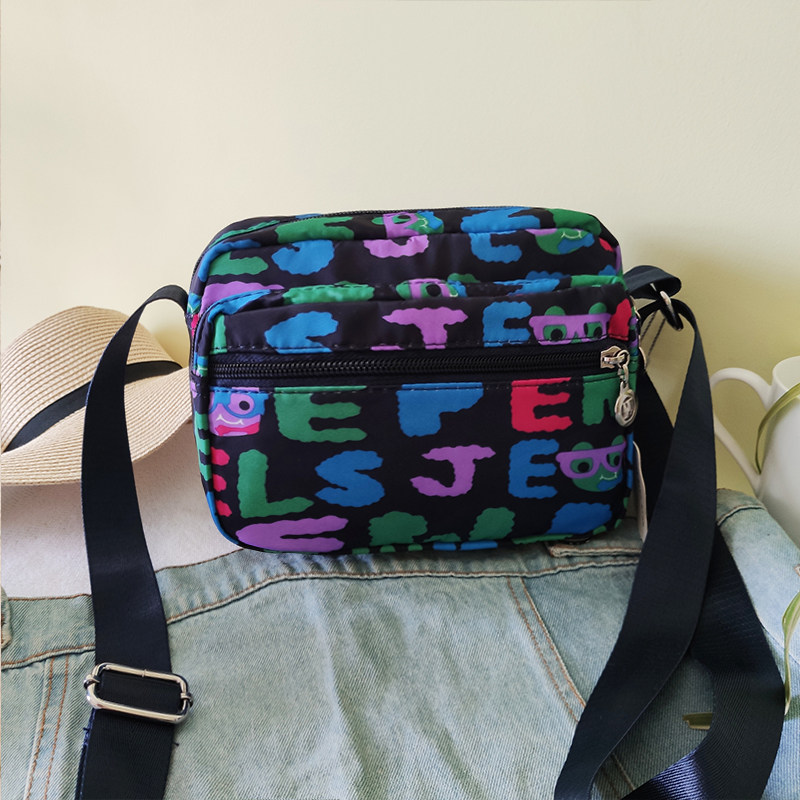 轻便布包女2024新款潮百搭印花迷你小包中年妈妈包牛津帆布斜挎包,淘宝优惠券,粉丝福利购,淘宝优惠卷