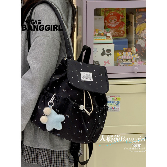 Schoolbags for junior high school girls, ins-style, good-looking, niche high school students, polka-dot backpacks for travel, college style small backpacks