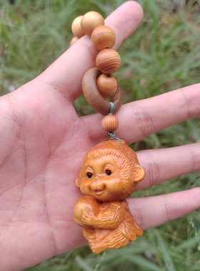 崖柏生肖猴款手把件木质小手捻指