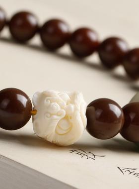 醒狮献瑞咖色陈籽双圈菩提手串