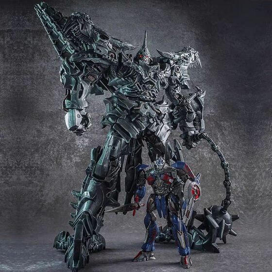 Transformed toy alloy enlarged version of the cable dinosaur