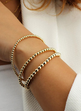 星合供应跨境简约时尚串珠金色钢珠303弹力不锈钢手串欧美手链女