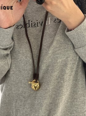 Picnique锁心人镀金皮绳长项链