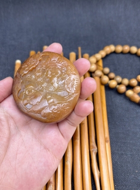 和田玉籽料黄沁黄玉人财两旺手把件