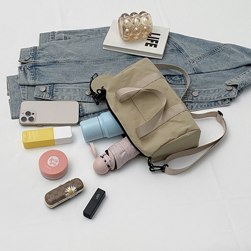 韩版时尚简约水洗布女斜挎包学生外出休闲手提单肩包圆筒收纳包,淘宝优惠券,粉丝福利购,淘宝优惠卷