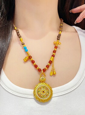 金包银点钻花丝如意可转动吊坠尖晶石镂空铃兰花双钩链女