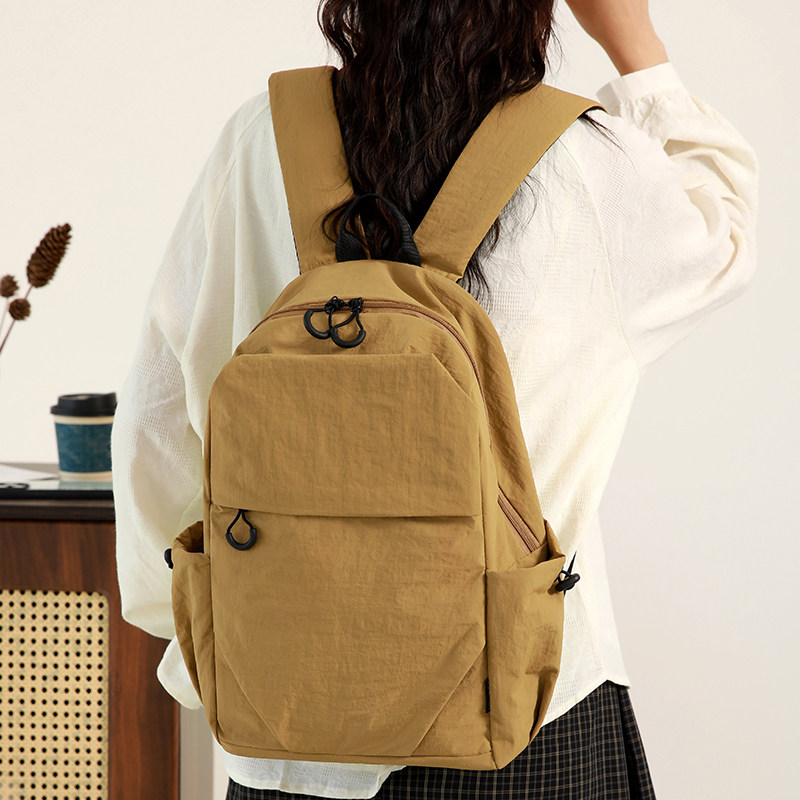 2025新款户外运动双肩包女书包男女牛津布纯色轻便多功能通勤背包,淘宝优惠券,粉丝福利购,淘宝优惠卷